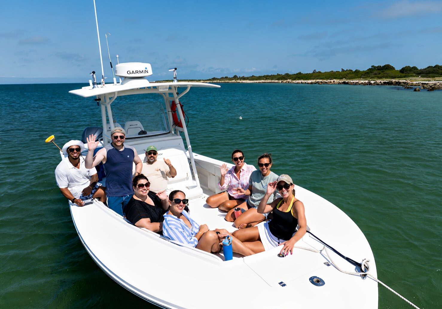 Group enjoying a boat ride on water.